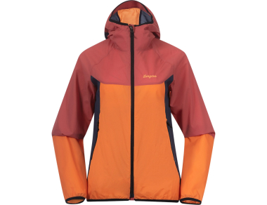 The women's Bergans Vaagaa Windbreaker jacket in faded orange/dusty rust is an ultra-lightweight windbreaker designed for mountain running, cycling, climbing, and mountain treks.